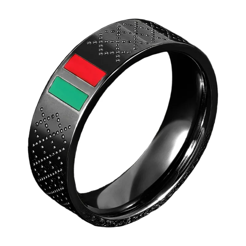 Bague avec incrustations en émail rouge et vert, acier inoxydable
