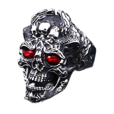 Anillo Statement de tres calaveras con piedras rojas, acero inoxidable