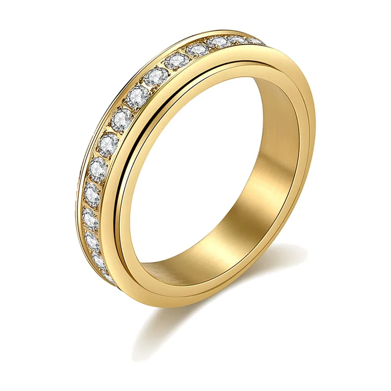Anillo spinner con circonitas transparentes, acero inoxidable